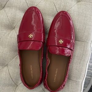 Tory Burch red patent flat.  Perfect condition.  Barely worn